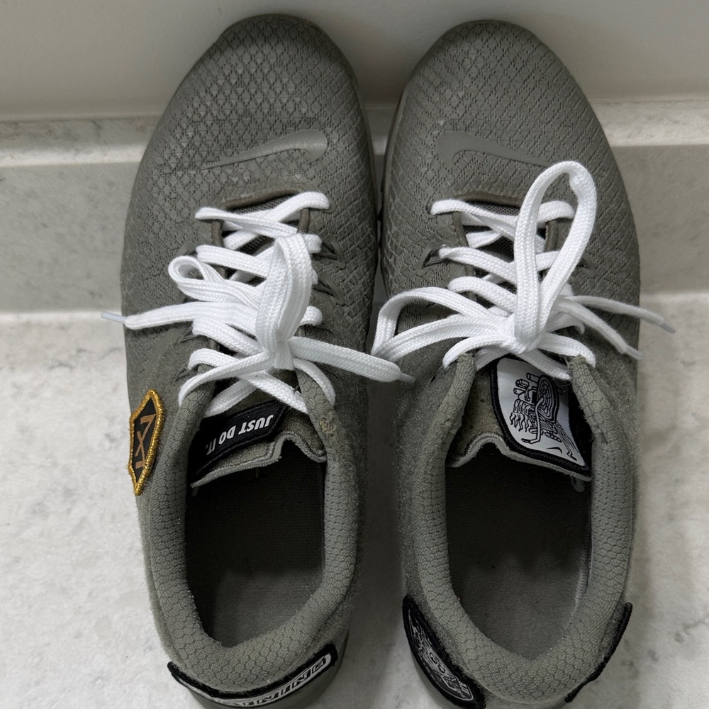 Nike Gray Metcon Training Sneakers with patches and white laces.  Size 10.5